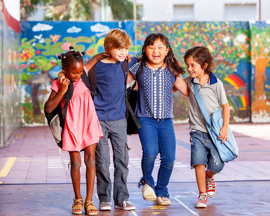 Multi-cultural group of kids at school